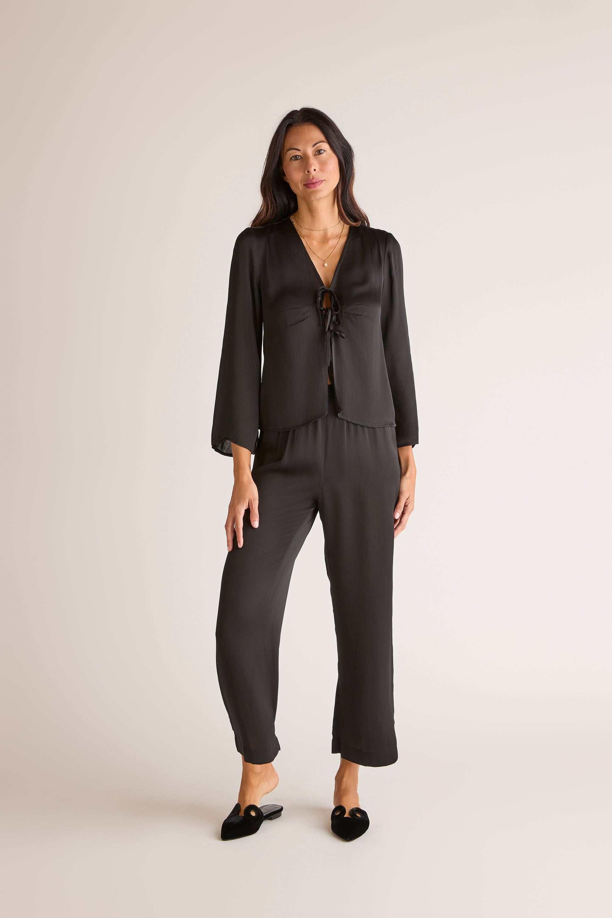 The Sōlune Muse Set Black — chic black satin resortwear set with Y2K-inspired lace-up blouse and satin lounge pants