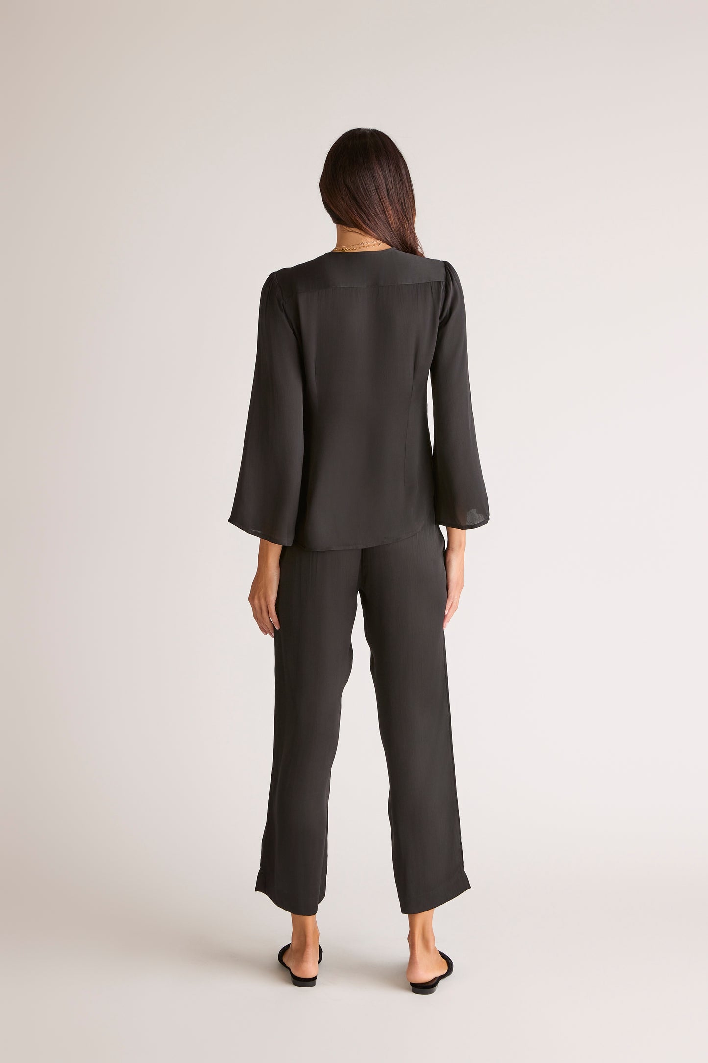 The Solune Muse Set Black — black satin travel and leisure set with adjustable front top and wide-leg satin pants