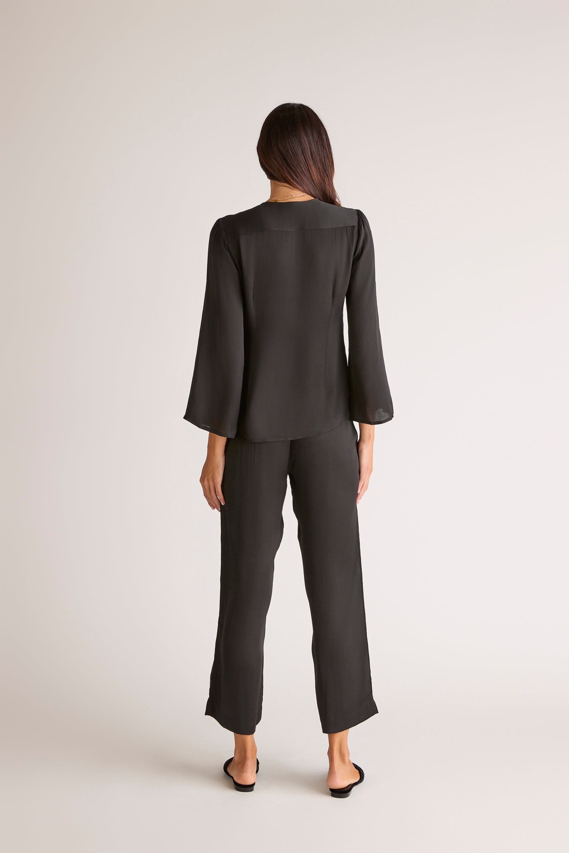 The Solune Muse Set Black — black satin travel and leisure set with adjustable front top and wide-leg satin pants