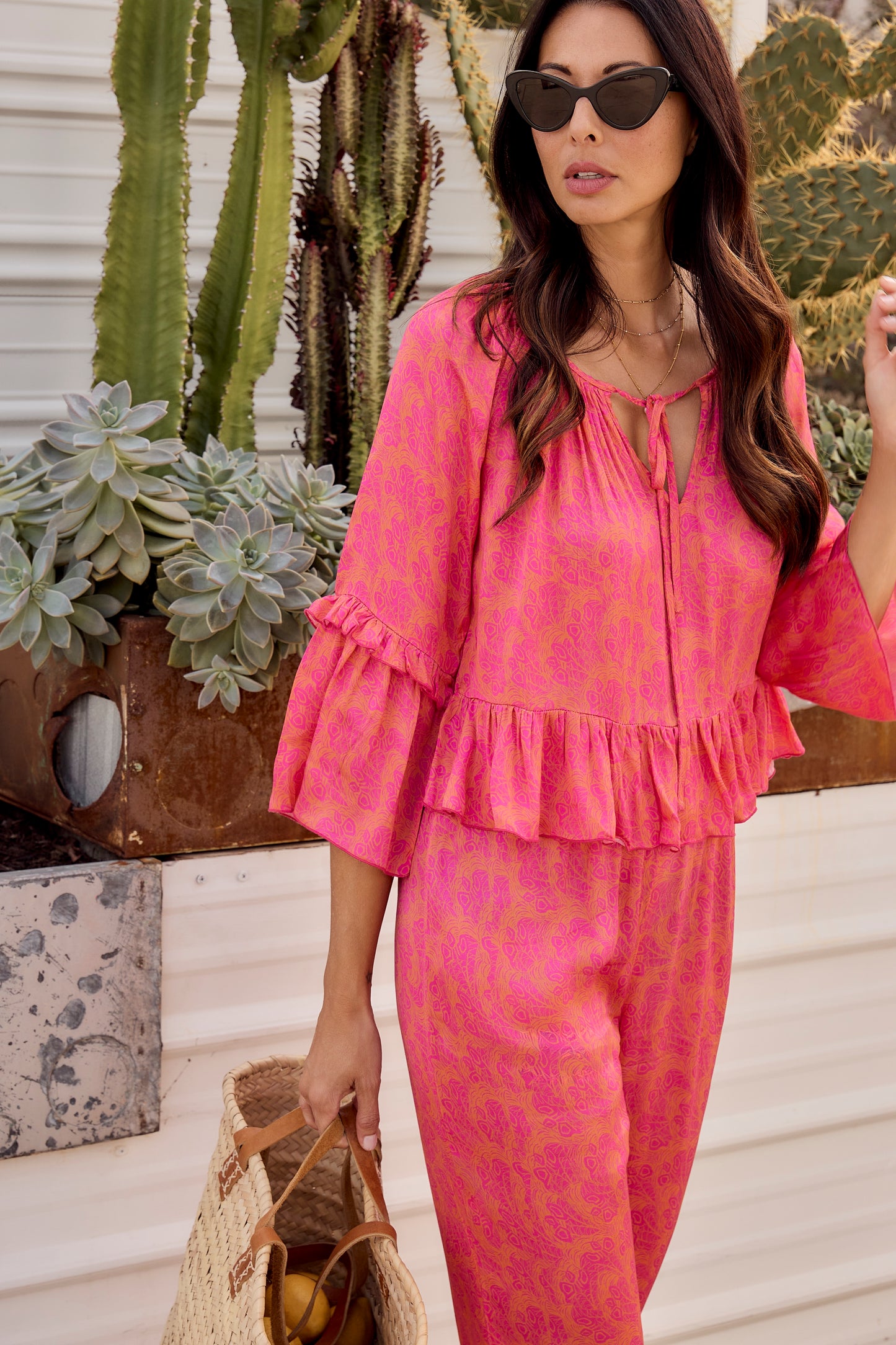 Sōlune Frills Set — women’s satin loungewear set in vibrant orange and hot pink feather print with relaxed pants